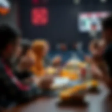 Employees enjoying snacks while watching a game together