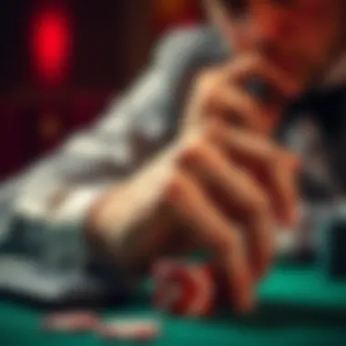A close-up of a player's hand thoughtfully contemplating a bet